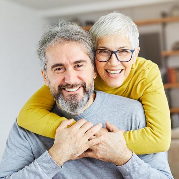 smiling middle aged couple