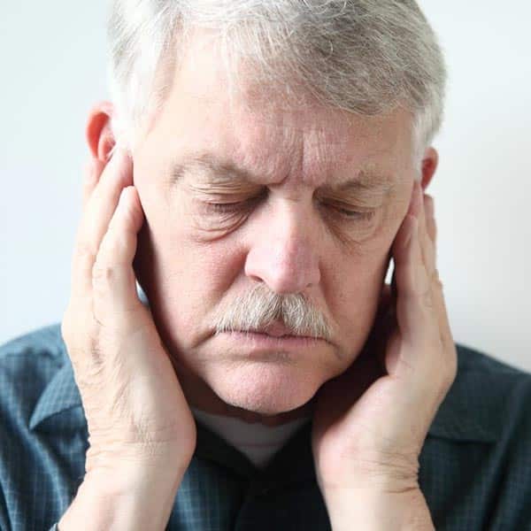 man with jaw pain